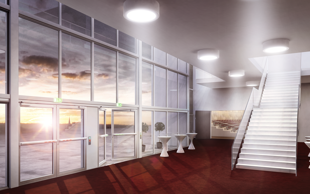 Foyer de théâtre, portes antipanique à deux vantaux avec barre tactile EVT à verrouillage électrique, portes fermées